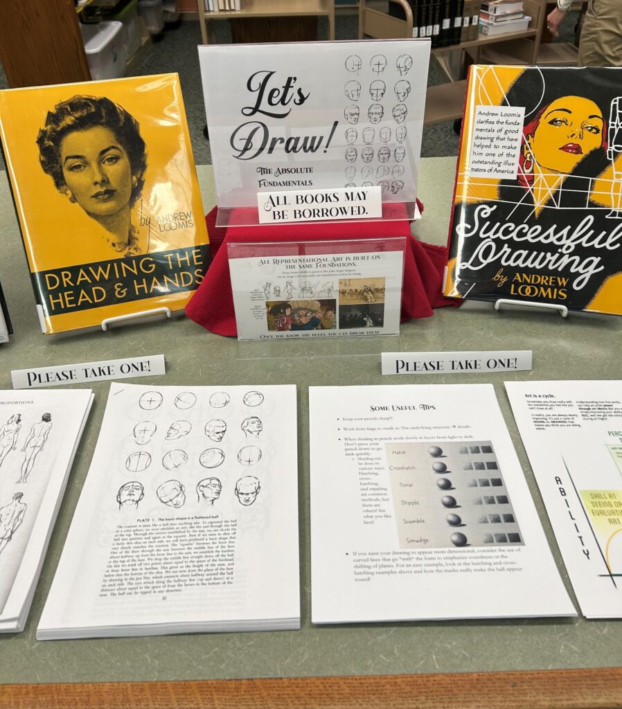 showing display of drawing books and instruction sheets at our circulation desk
