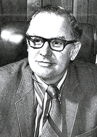 headshot of Dr. Cornelius Robbins